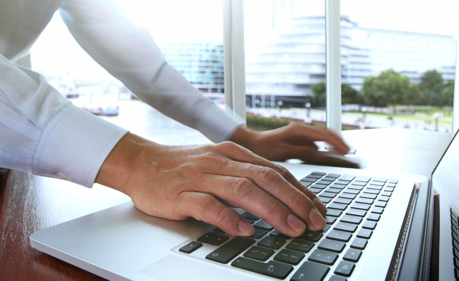 Team collaboration session showing designers working on mobile app wireframes